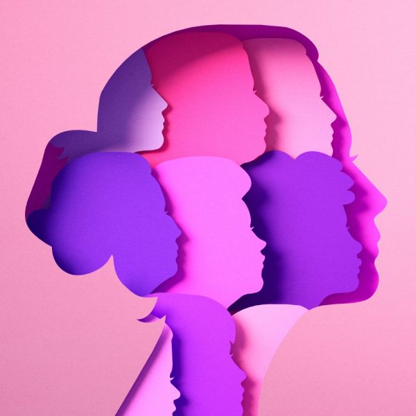 Layered silhouettes of women’s profiles in pink and purple hues